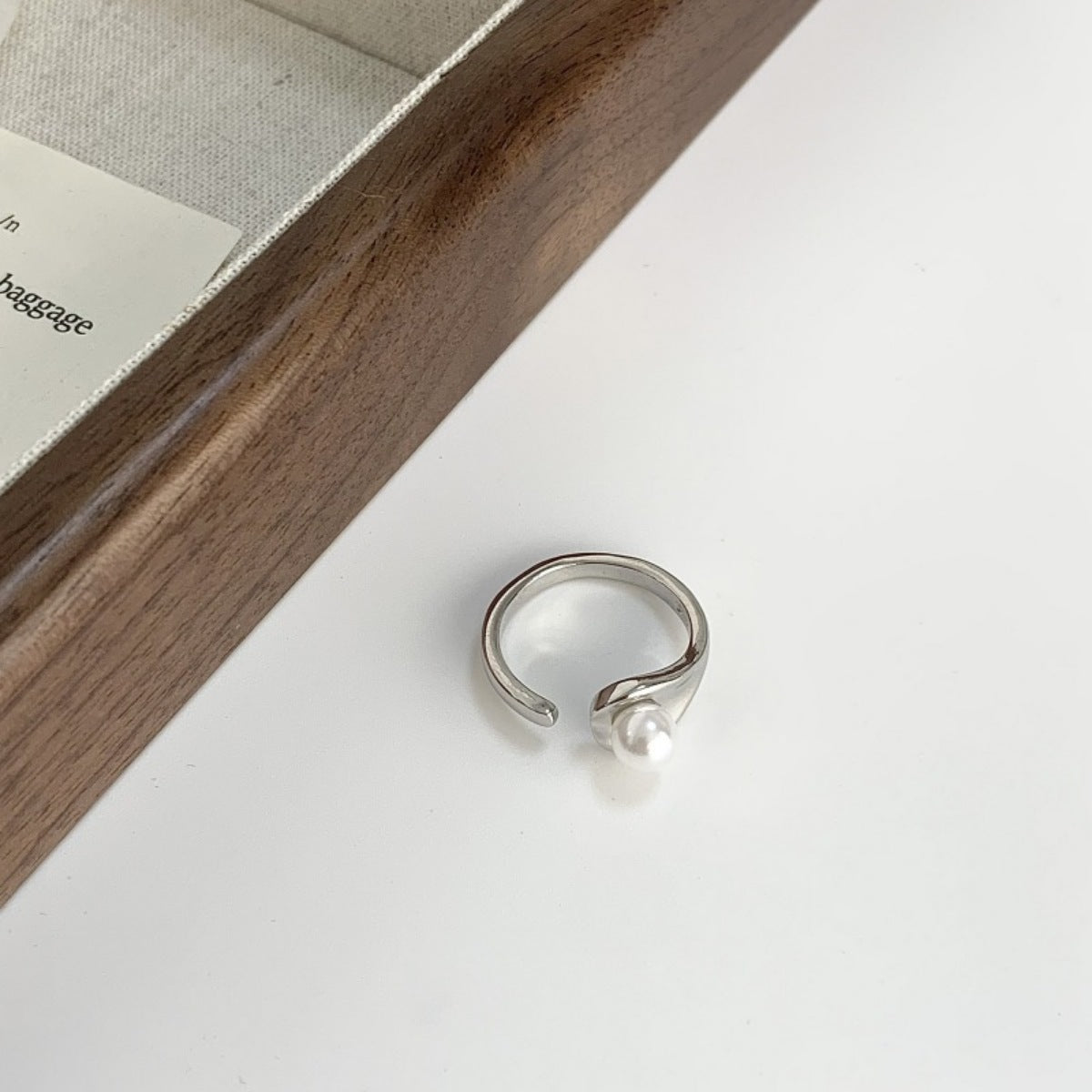 Rebellious Gal pearl accent open cuff ring front view on white background