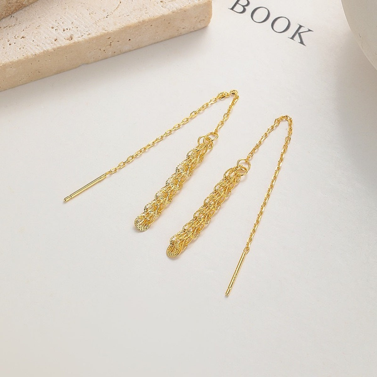 Close-up of 18K gold-plated chain threader earrings with delicate sterling silver links