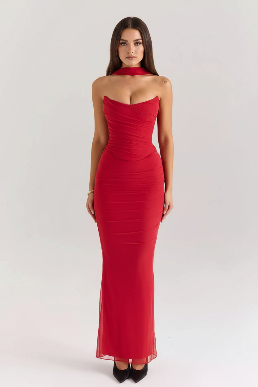Red strapless gown on a white background