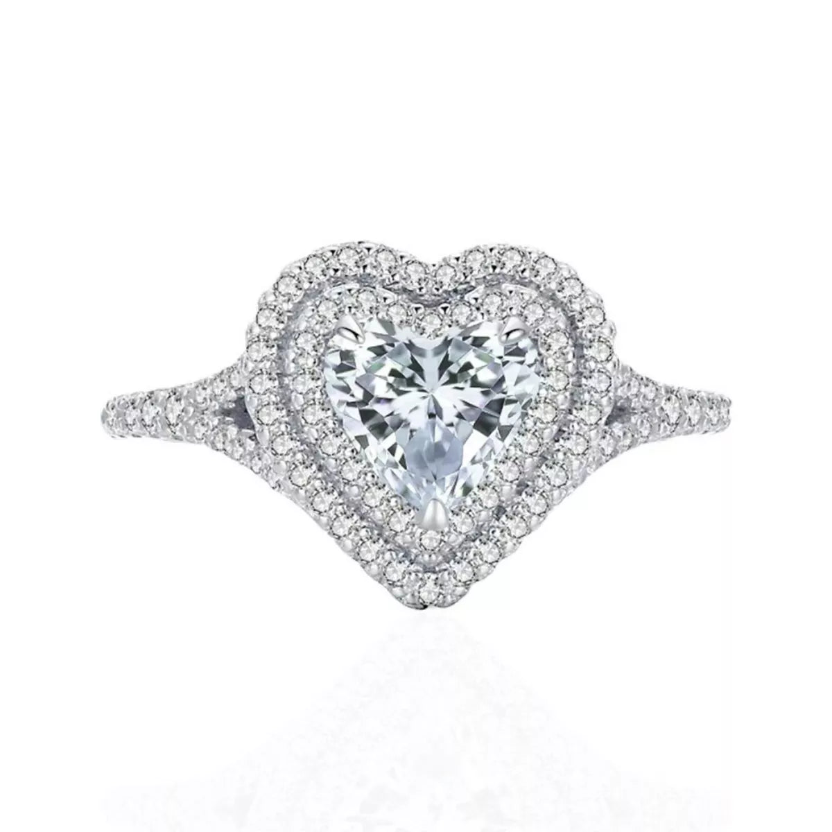 Close-up of a heart shaped diamond ring with white background