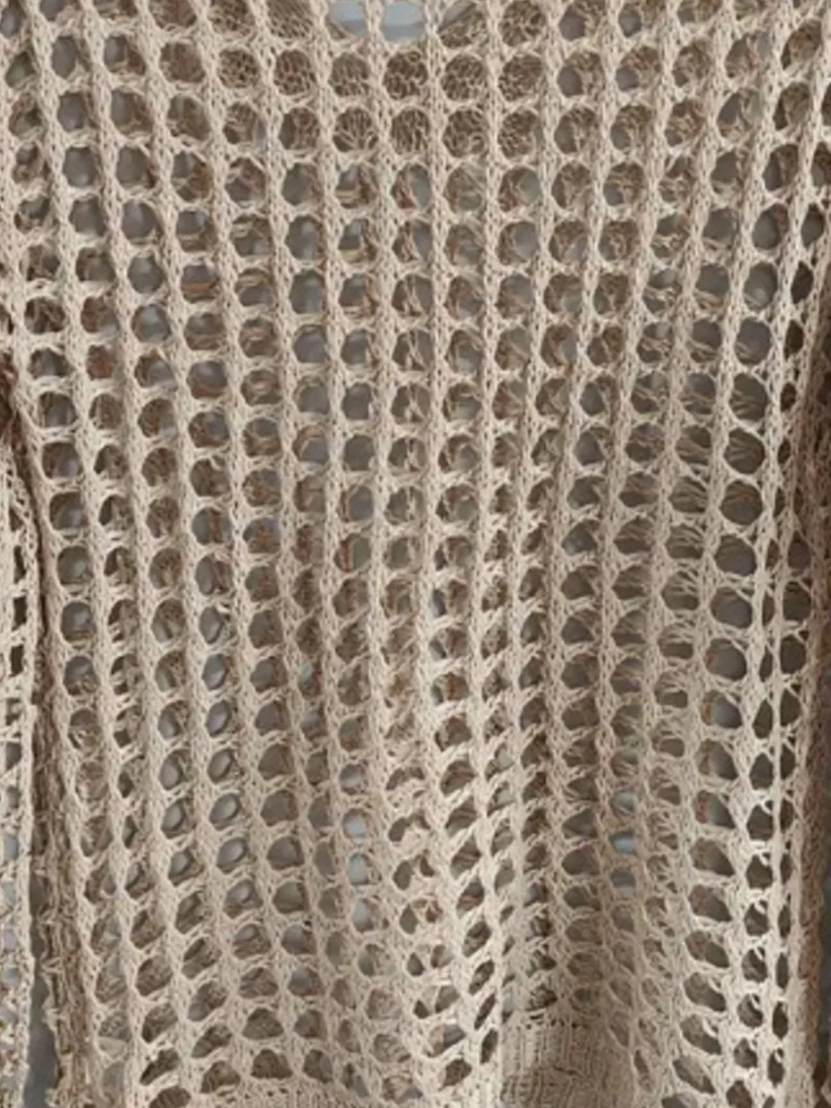 Close-up of a textured fabric with a grid pattern