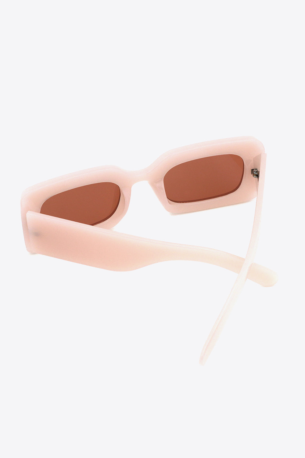 Sleek rectangle sunglasses worn by model