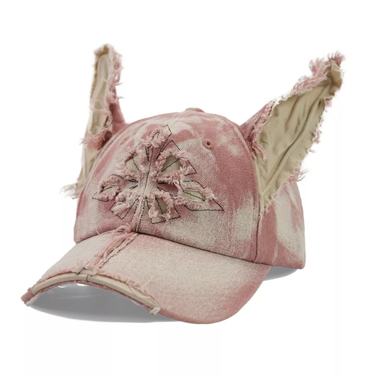 Close-up floppy dog ears on distressed denim baseball cap with washed fade