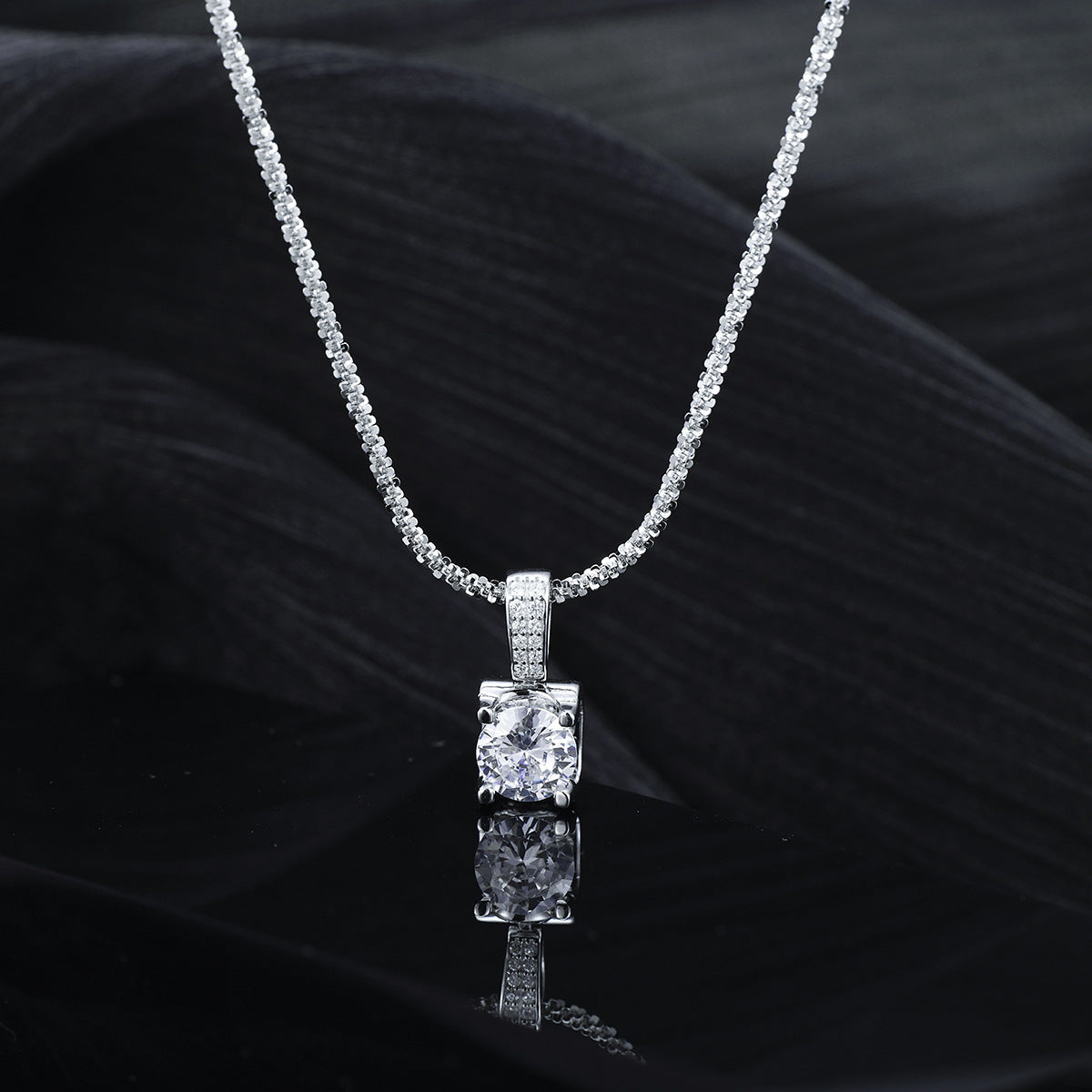 Lifestyle image: Rebellious Gal zircon pendant necklace styled with edgy outfit