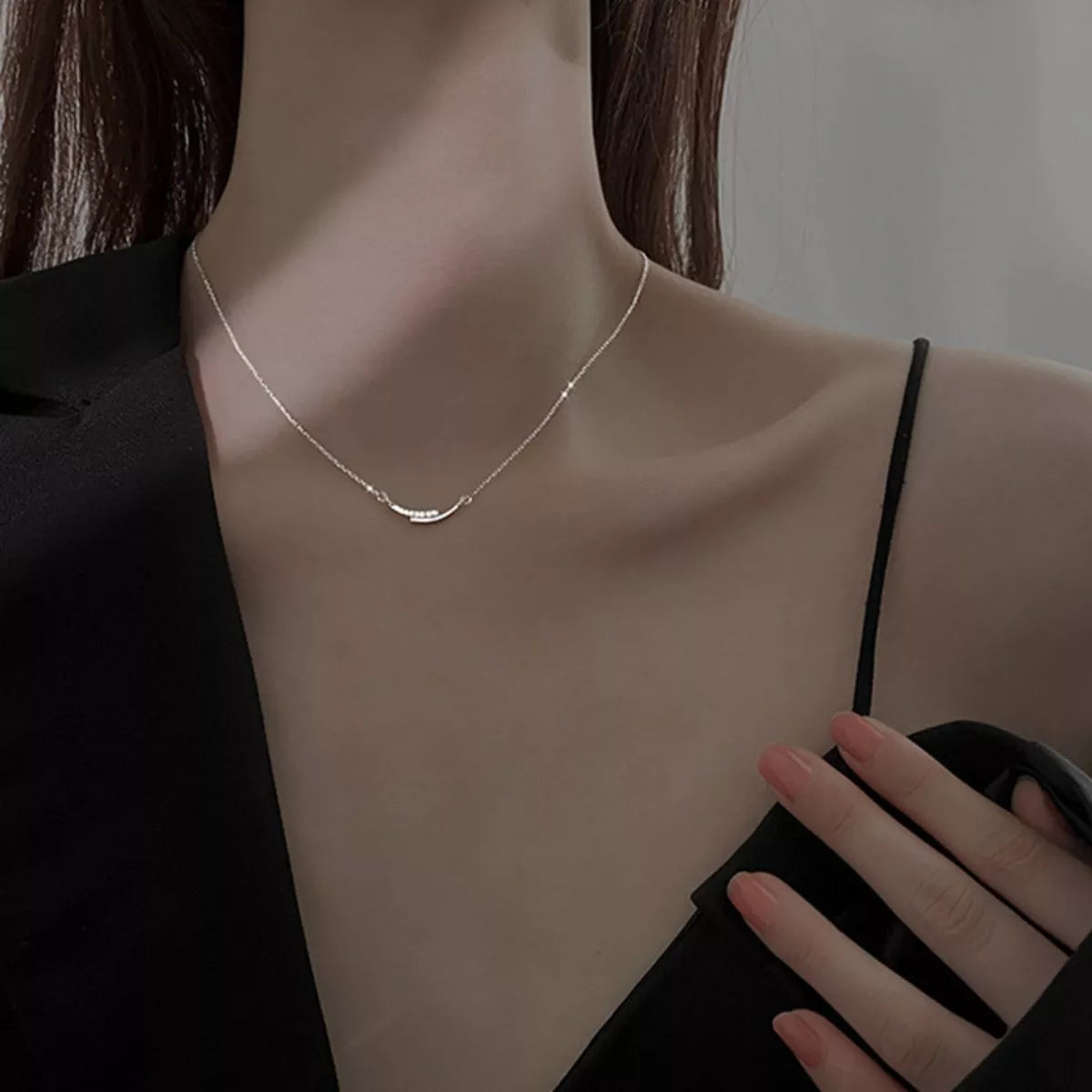 Dainty rhinestone pendant on sterling silver chain side detail