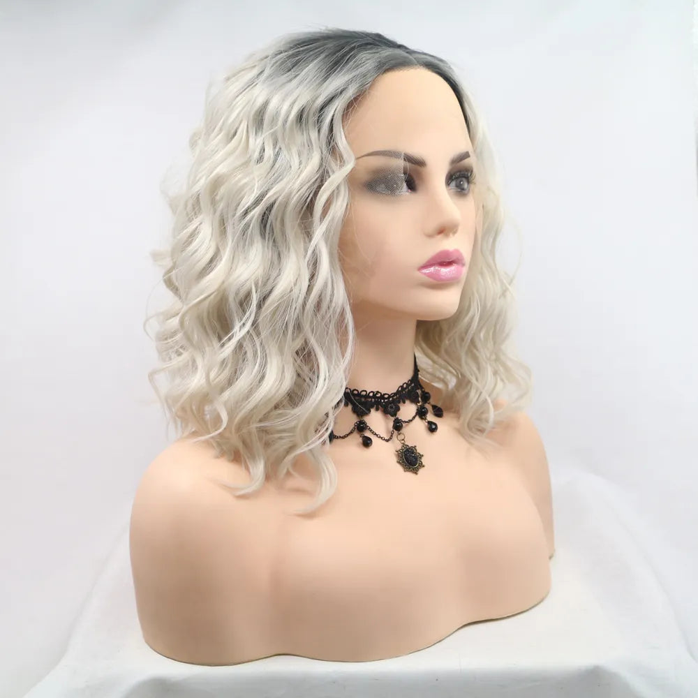 Back view of 12 inch mid-length wavy synthetic wig on studio mannequin