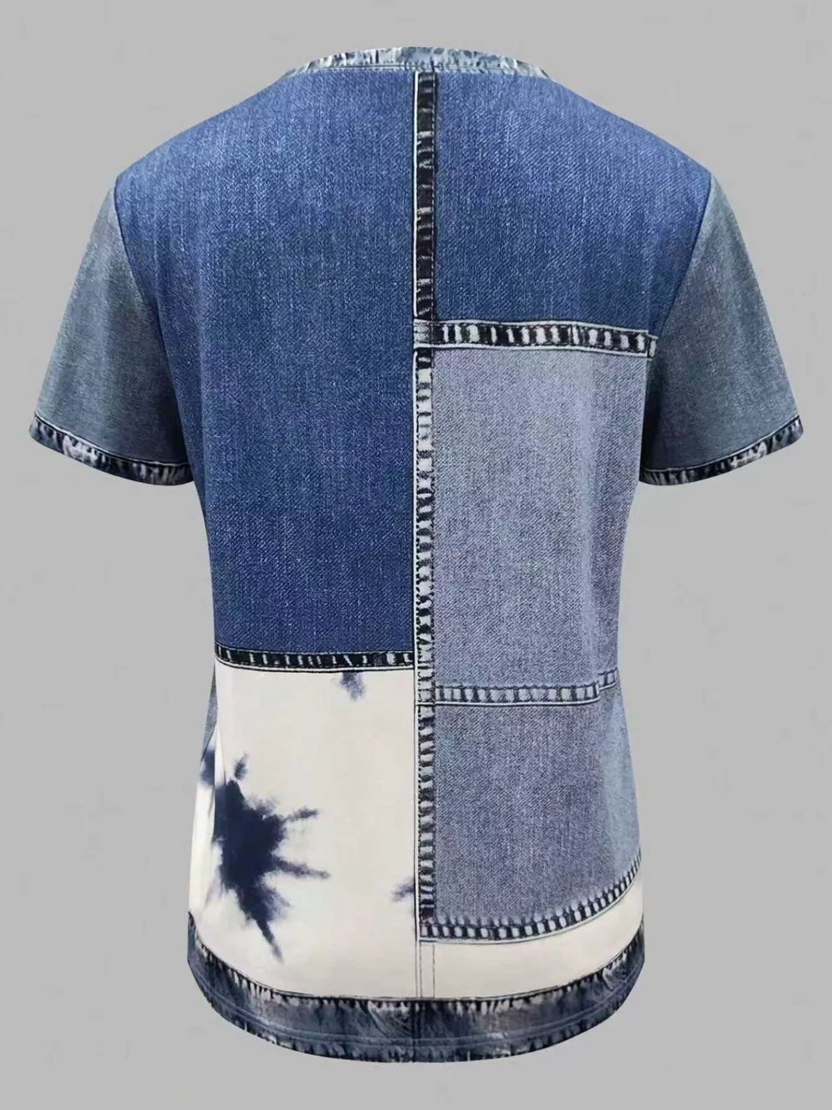 Denim and tie-dye patterned shirt on a gray background