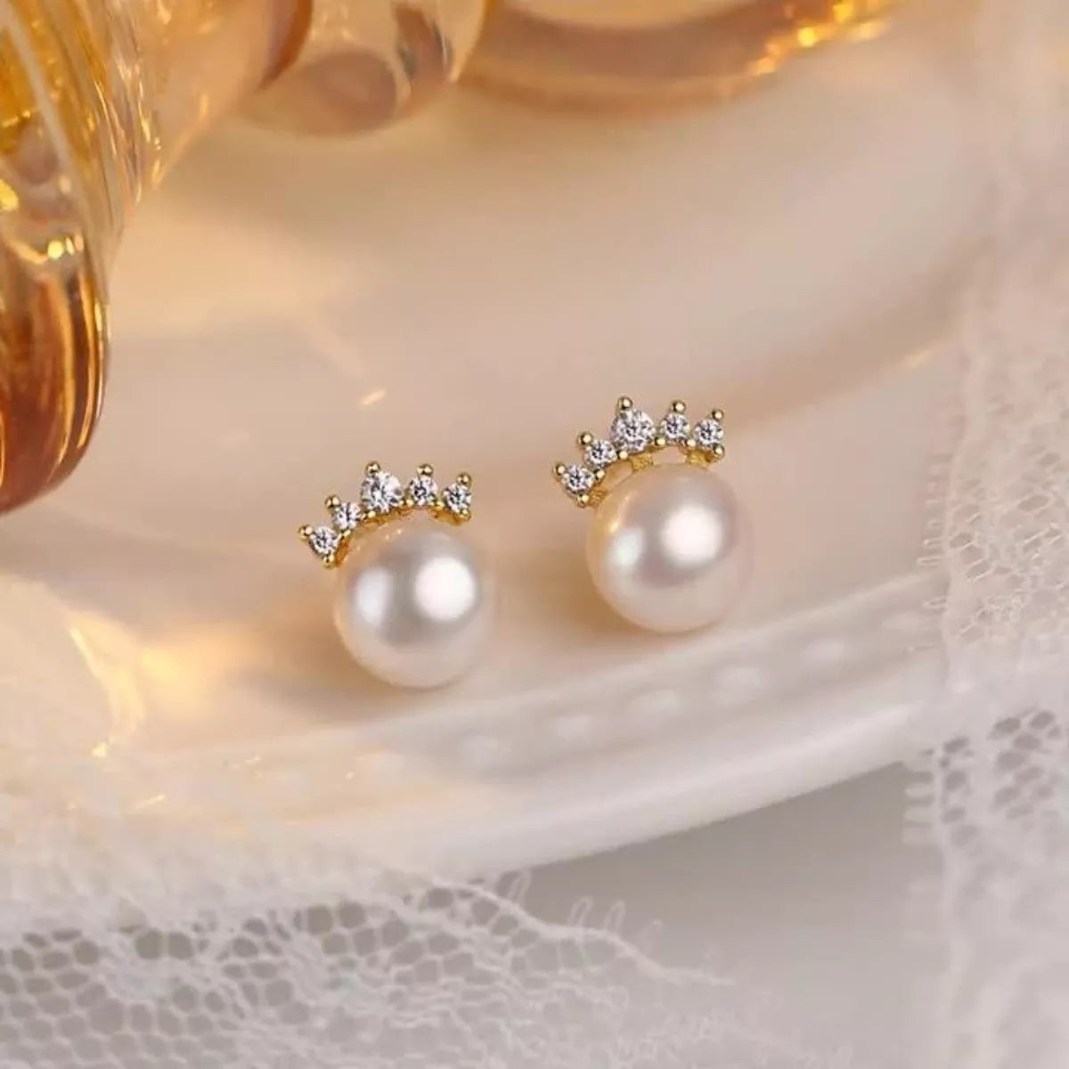 Rebellious Gal freshwater pearl stud earrings 925 sterling silver on white background