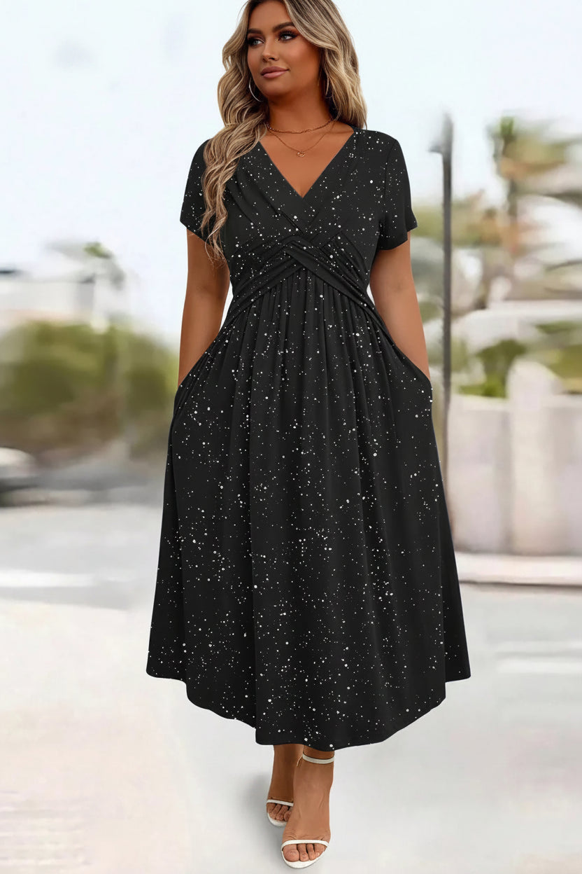Black dress with star pattern worn by a person outdoors
