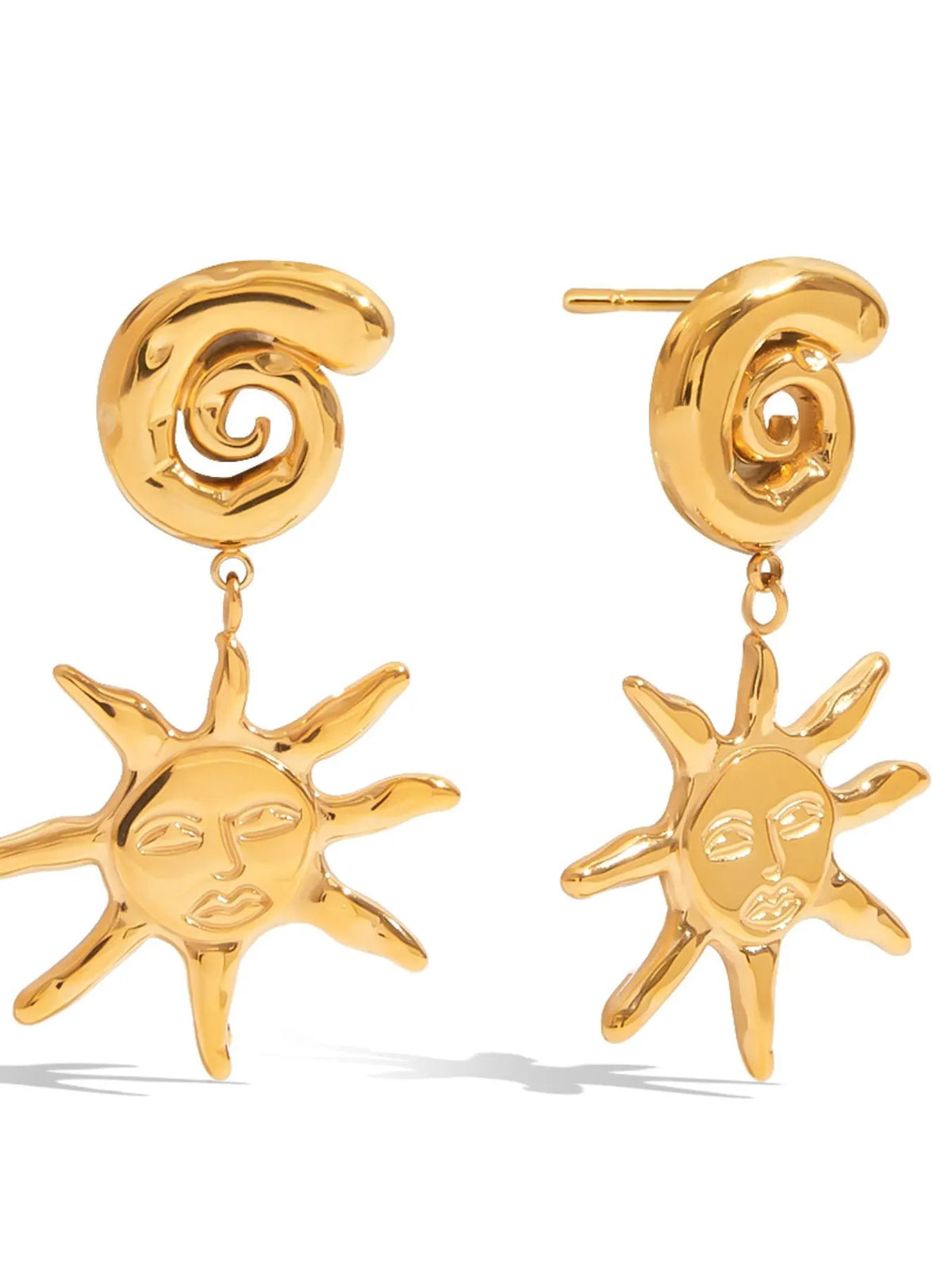 Gold sun-shaped earrings on a white background