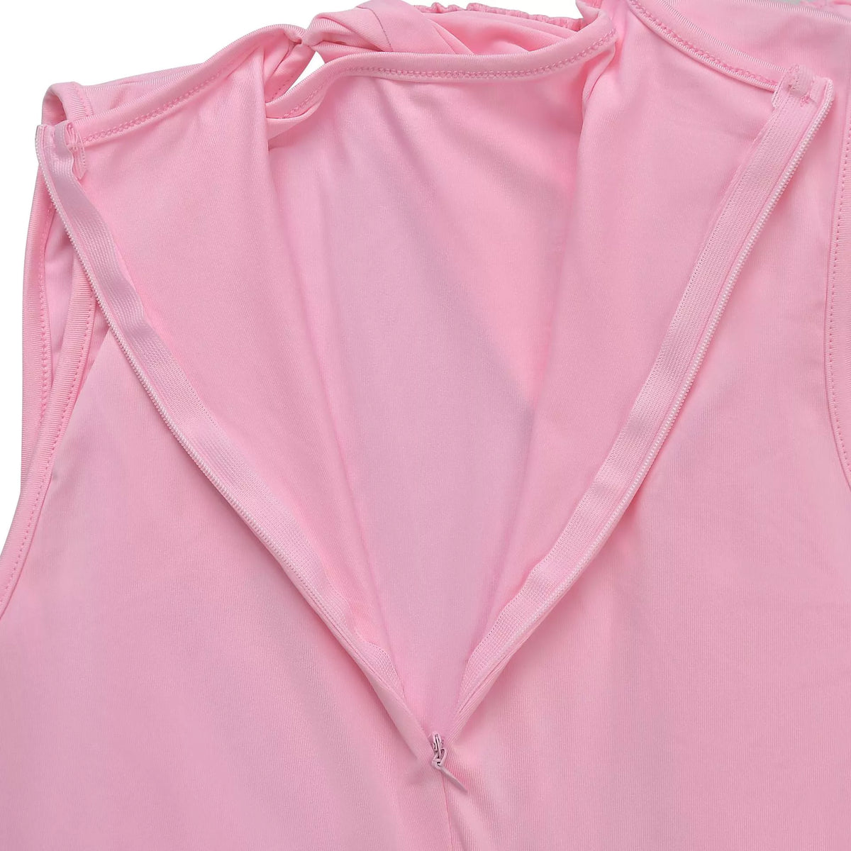 Close-up of a pink garment with a zipper, brand 'gritty soul' visible.