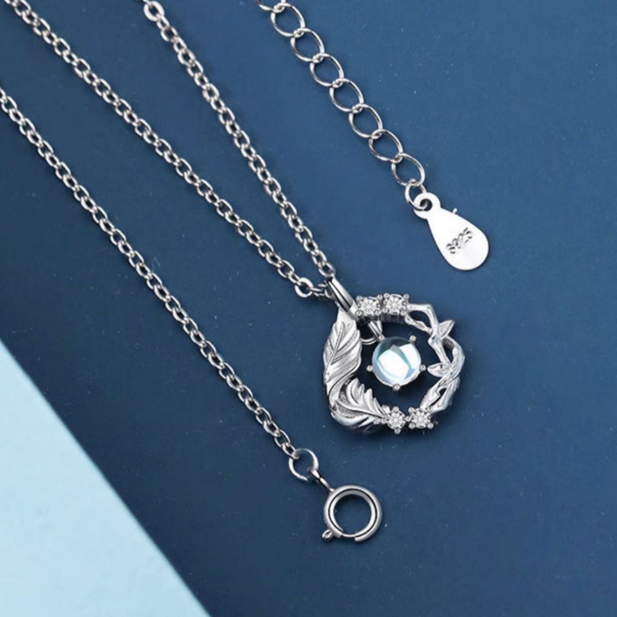 Model wearing Rebellious Gal zircon pendant necklace with rebellious layered look