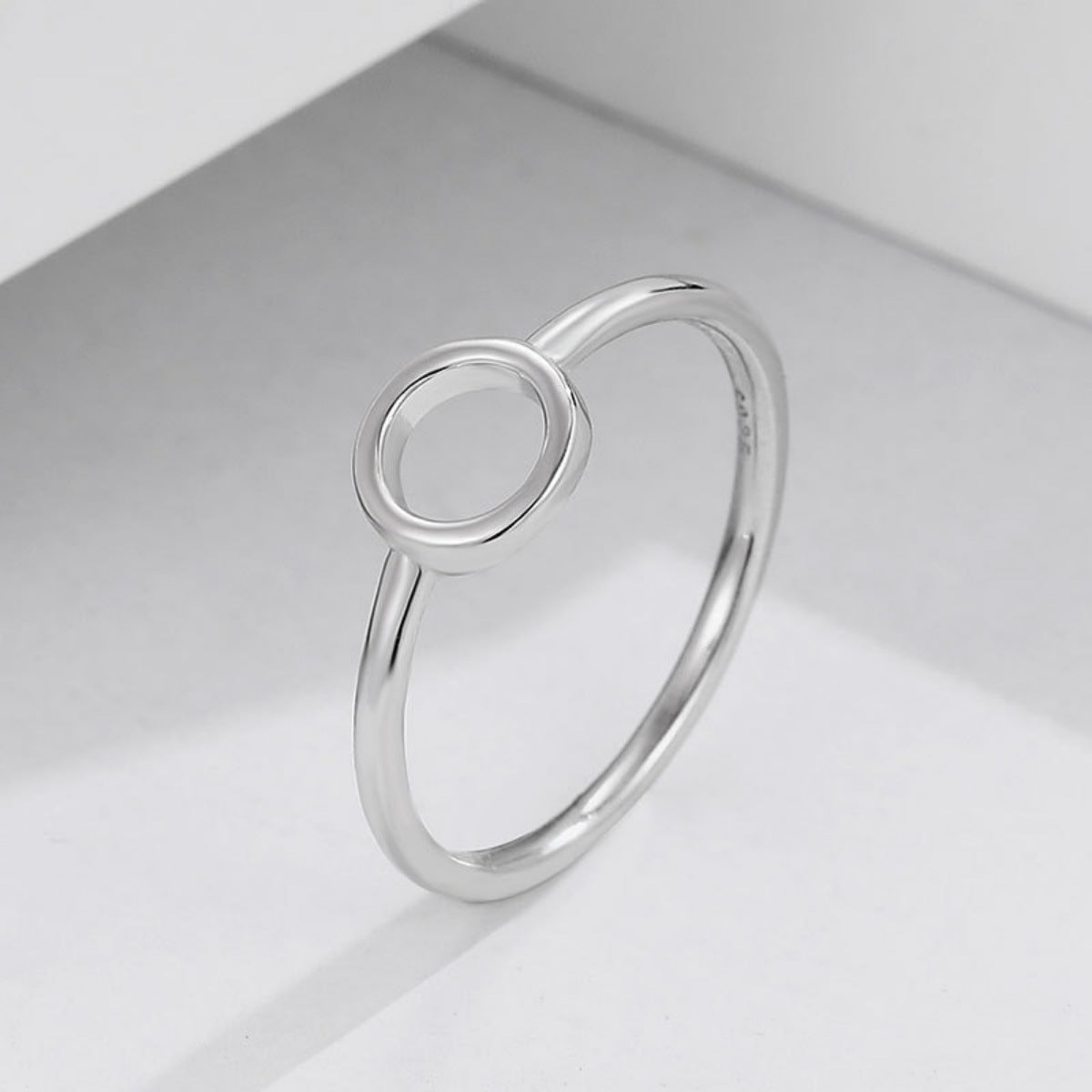 Detail shot of polished 925 sterling silver texture and clean circular shape
