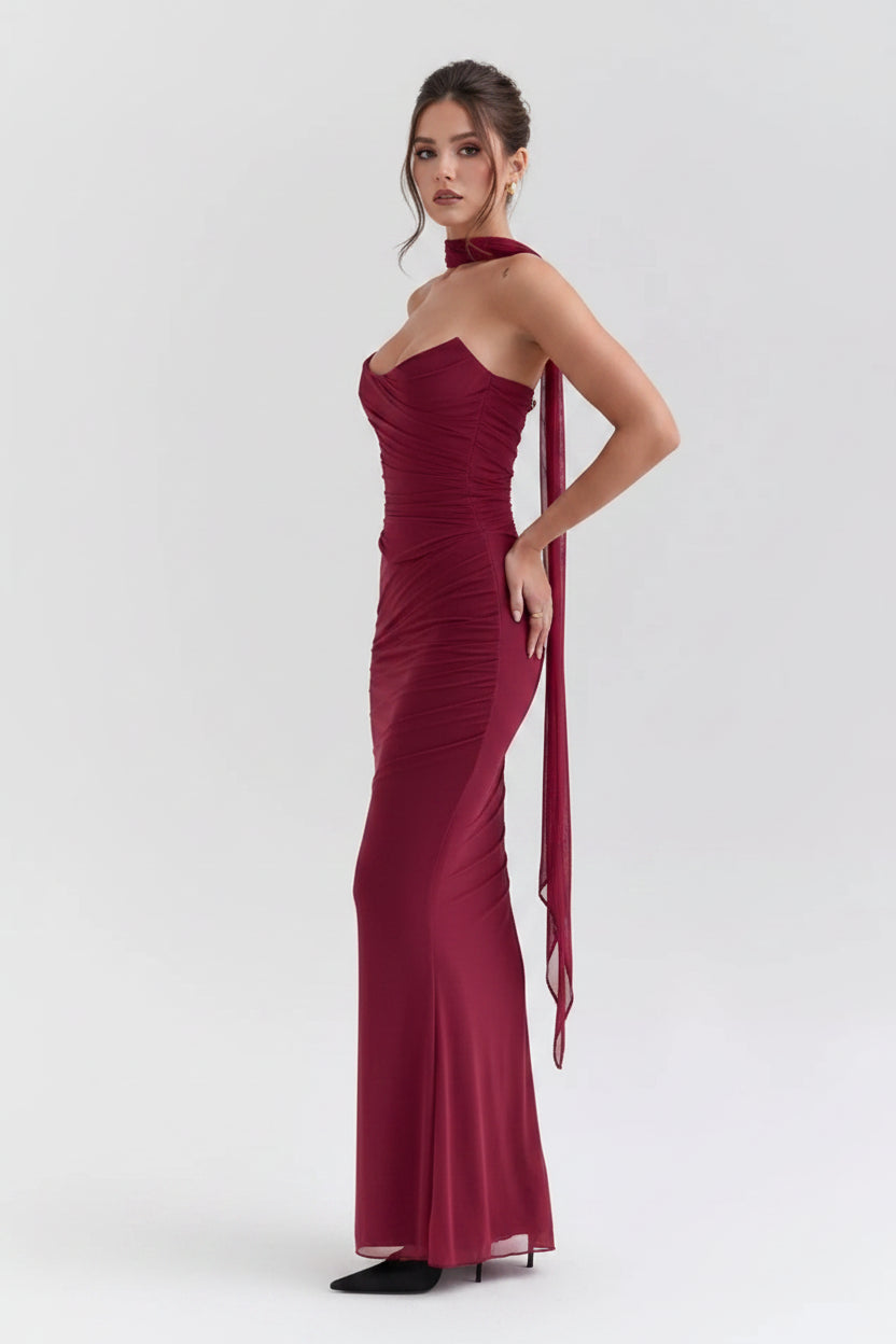 Maroon evening gown on a white background