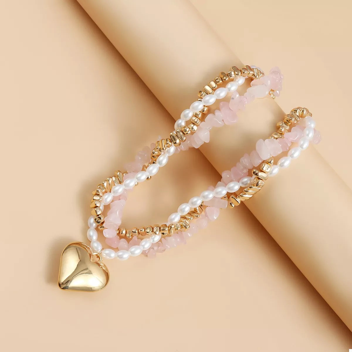 Trendy layered necklace with gold hearts