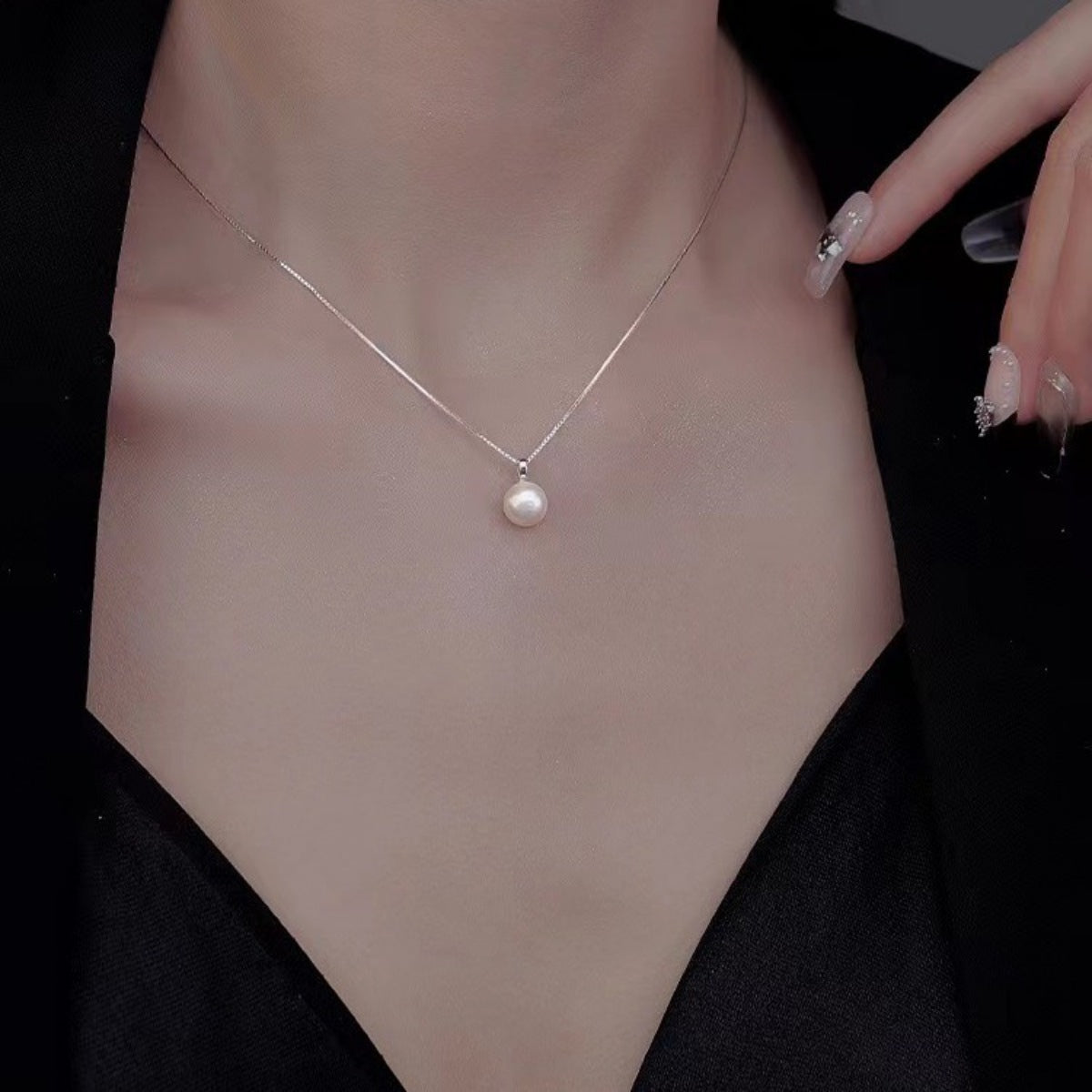 Dainty single freshwater pearl necklace sparkling with natural luster