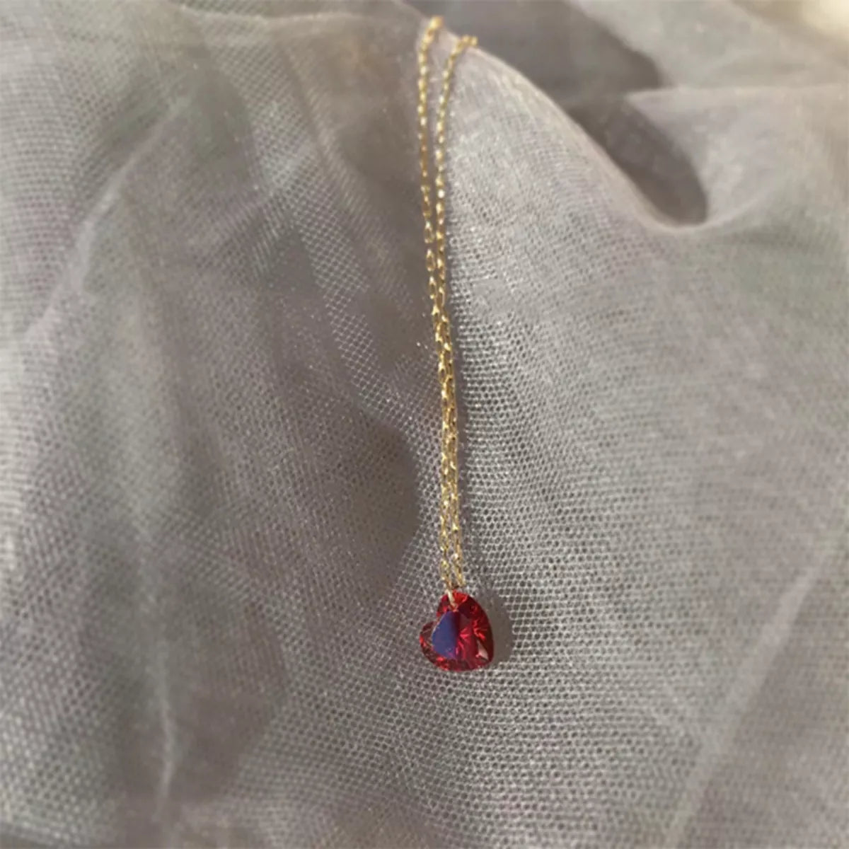 Sterling silver zircon heart necklace adjustable extension chain Rebellious Gal flat lay