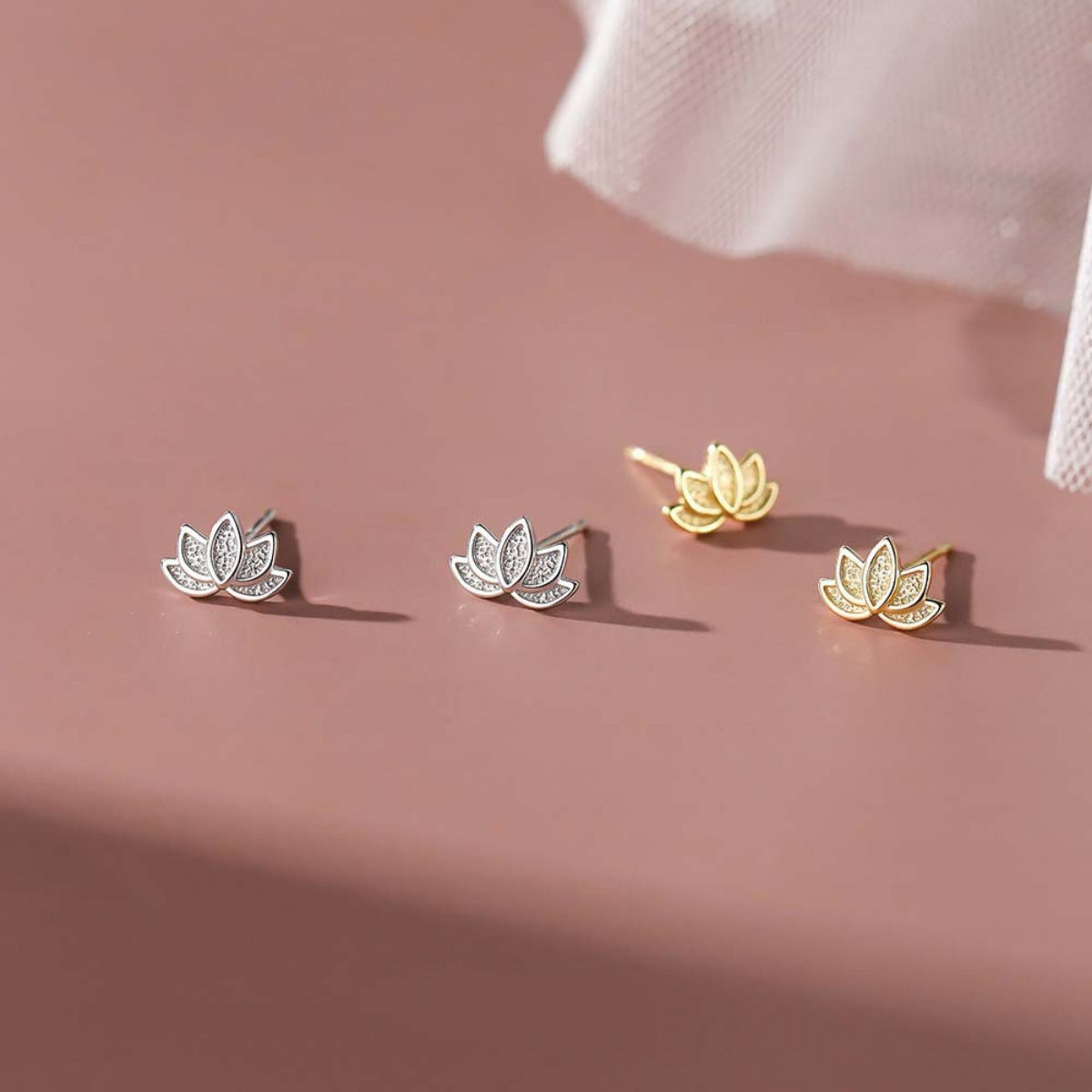 Close-up of Lotus Flower Stud Earrings in 18K gold-plated sterling silver
