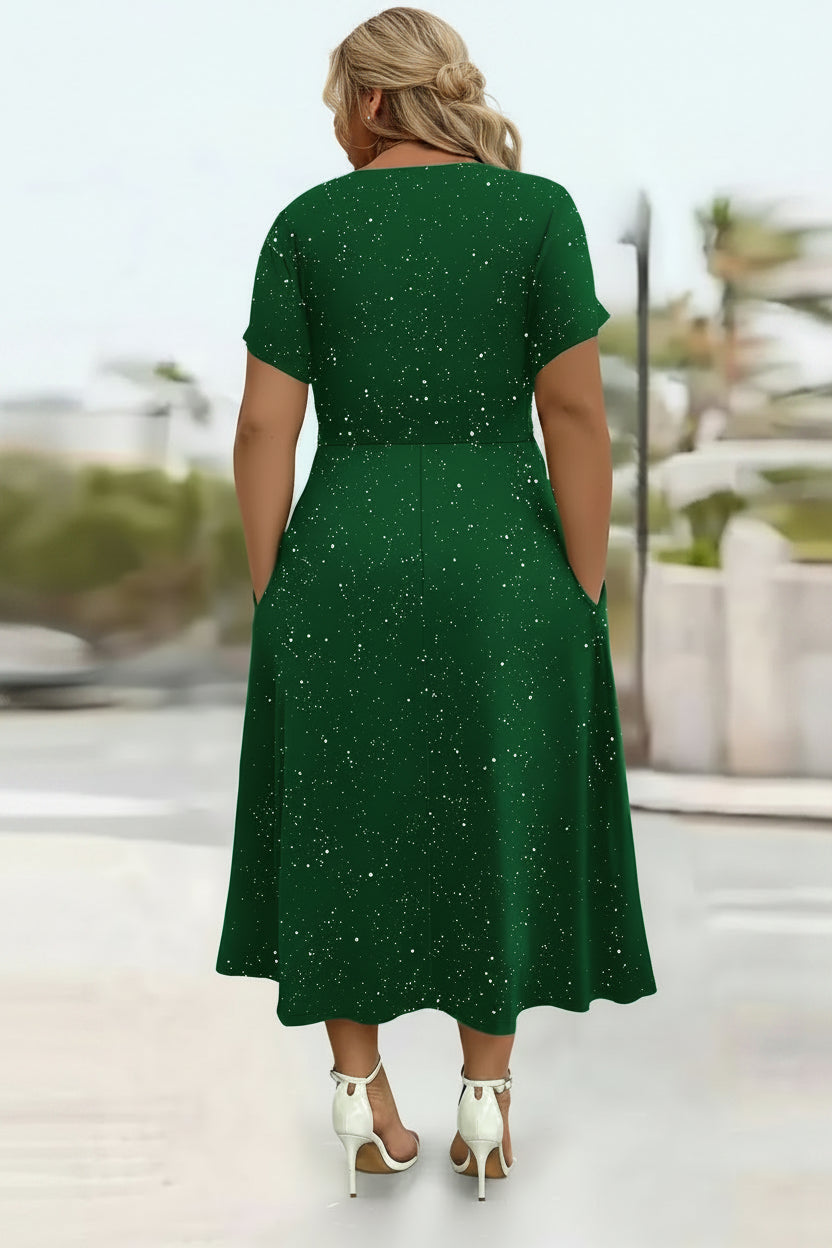 Plus Size model wearing green sparkle styled midi dress