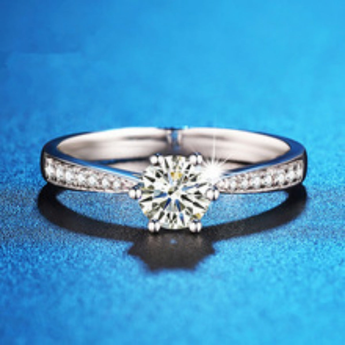 Close-up of brilliant 1ct moissanite stone in 925 sterling silver setting