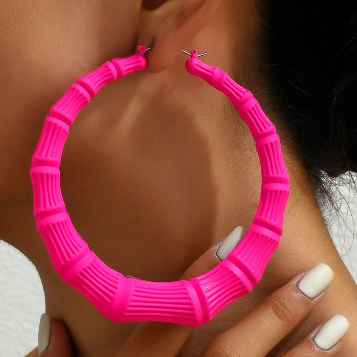 Detailed texture and gold plating on large hoop earrings trend focus