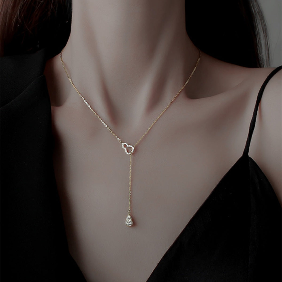 Side profile of zircon pendant necklace showing 15.7" chain and 2" extension