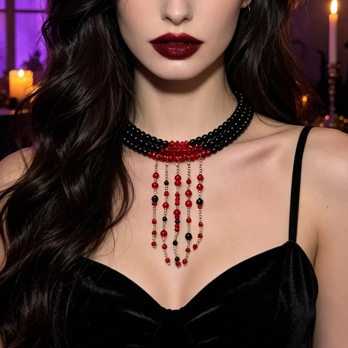 Close-up of the black bead choker with red beaded fringe at the throat