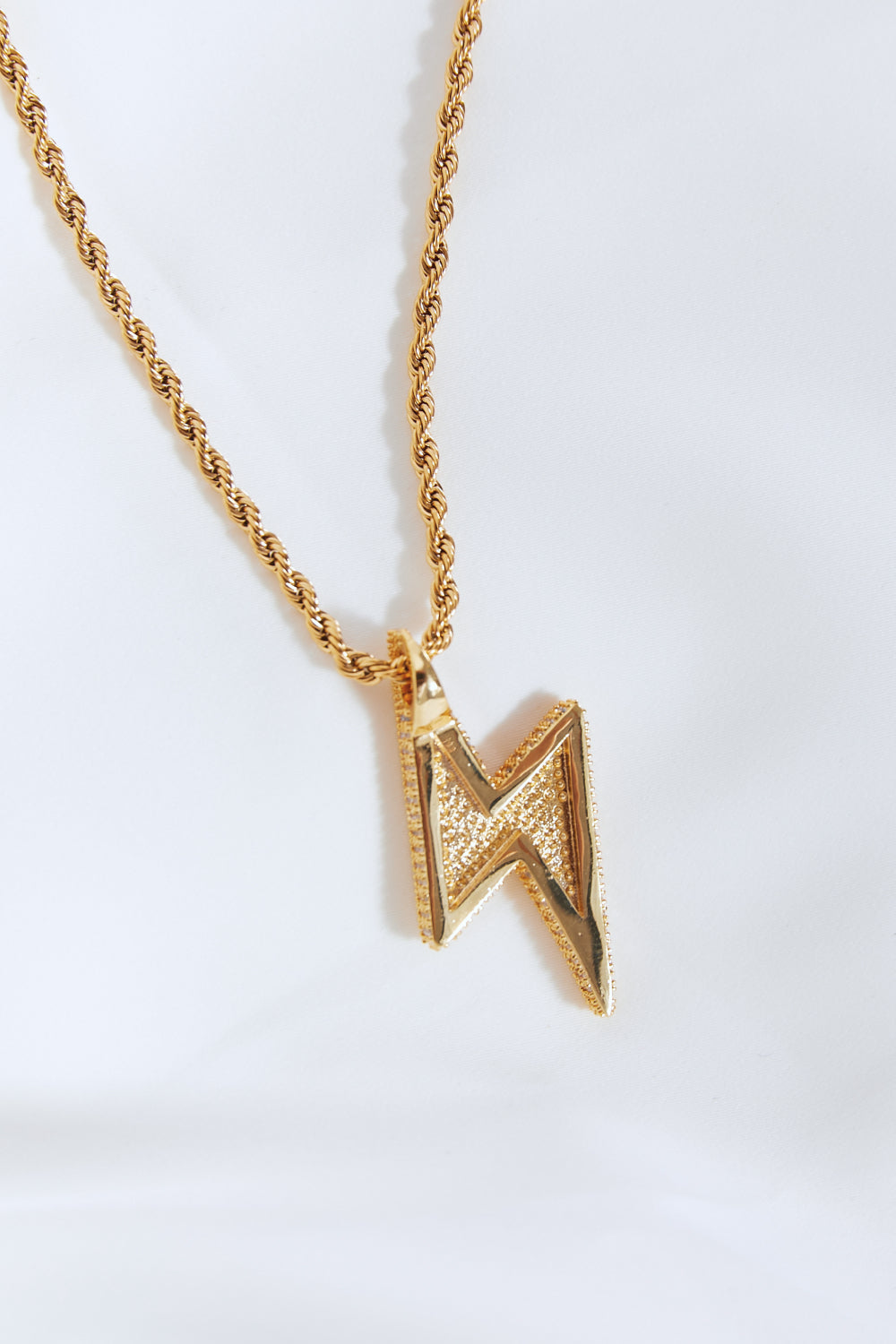 Diamante Encrusted Brass Lightning Pendant Necklace - Close Up White Background - Rebellious Gal Jewelry