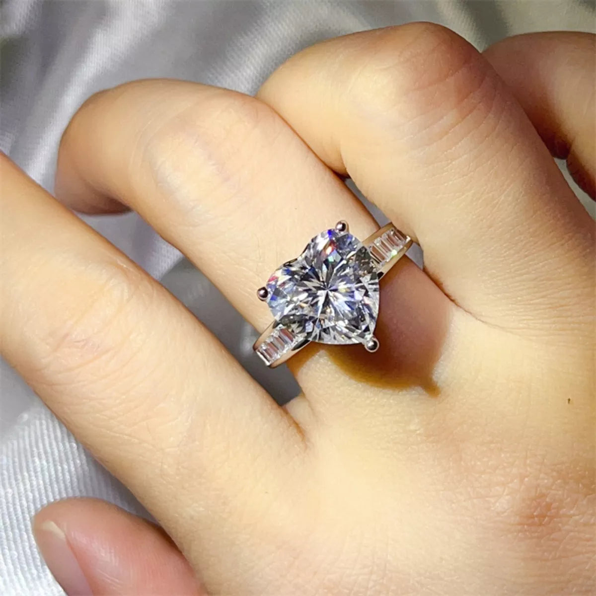 Rebellious Gal model wearing 5 carat moissanite heart ring bold statement look