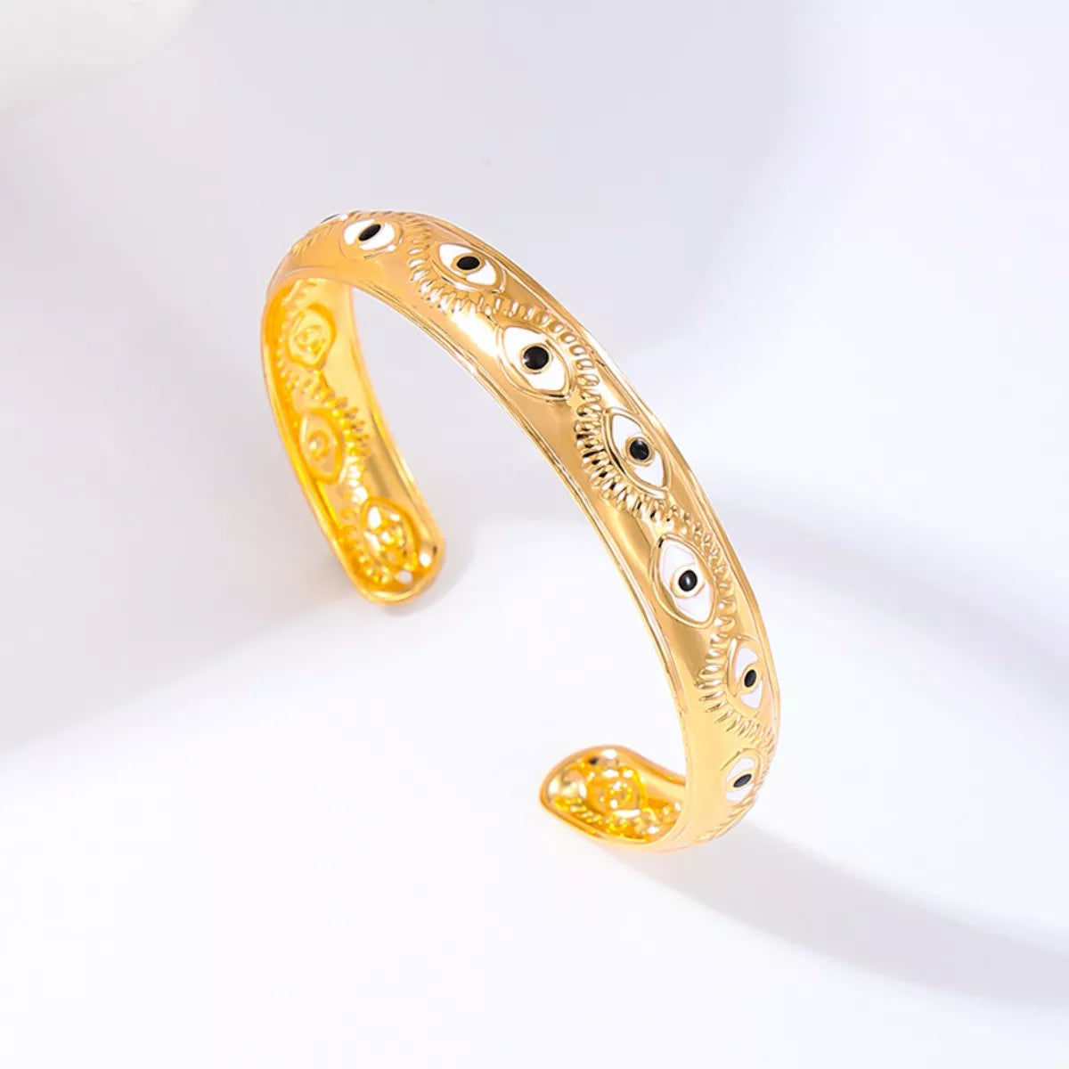 Evil Eye Open Gold Plated Bangle Close Up View Top - Rebellious Gal