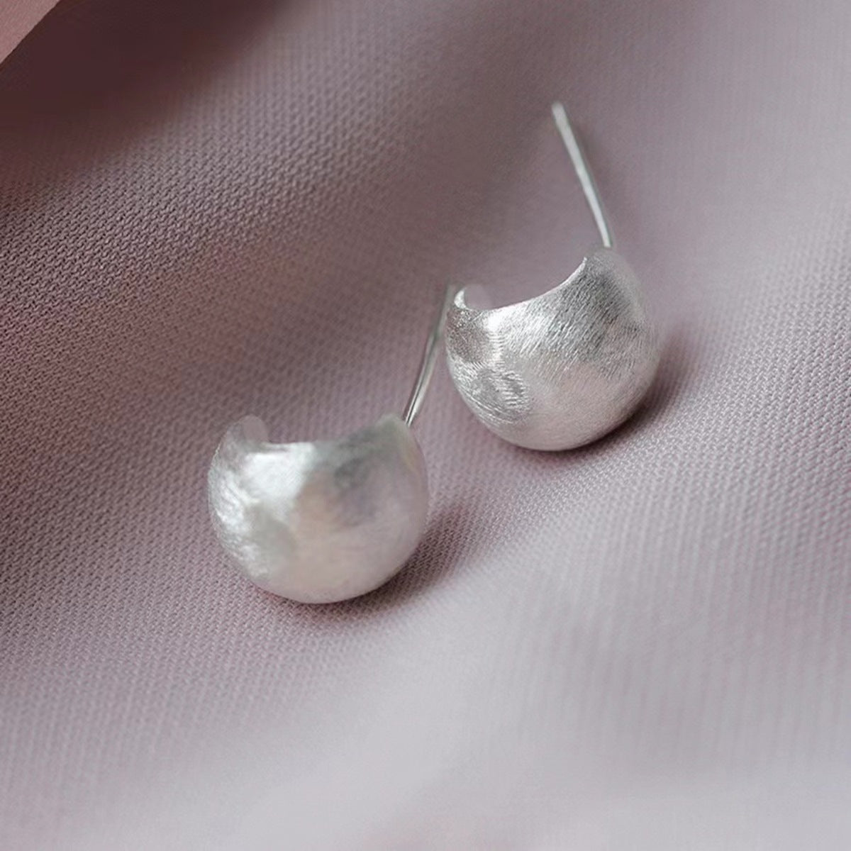 Detail shot of sterling silver C-Hoop texture