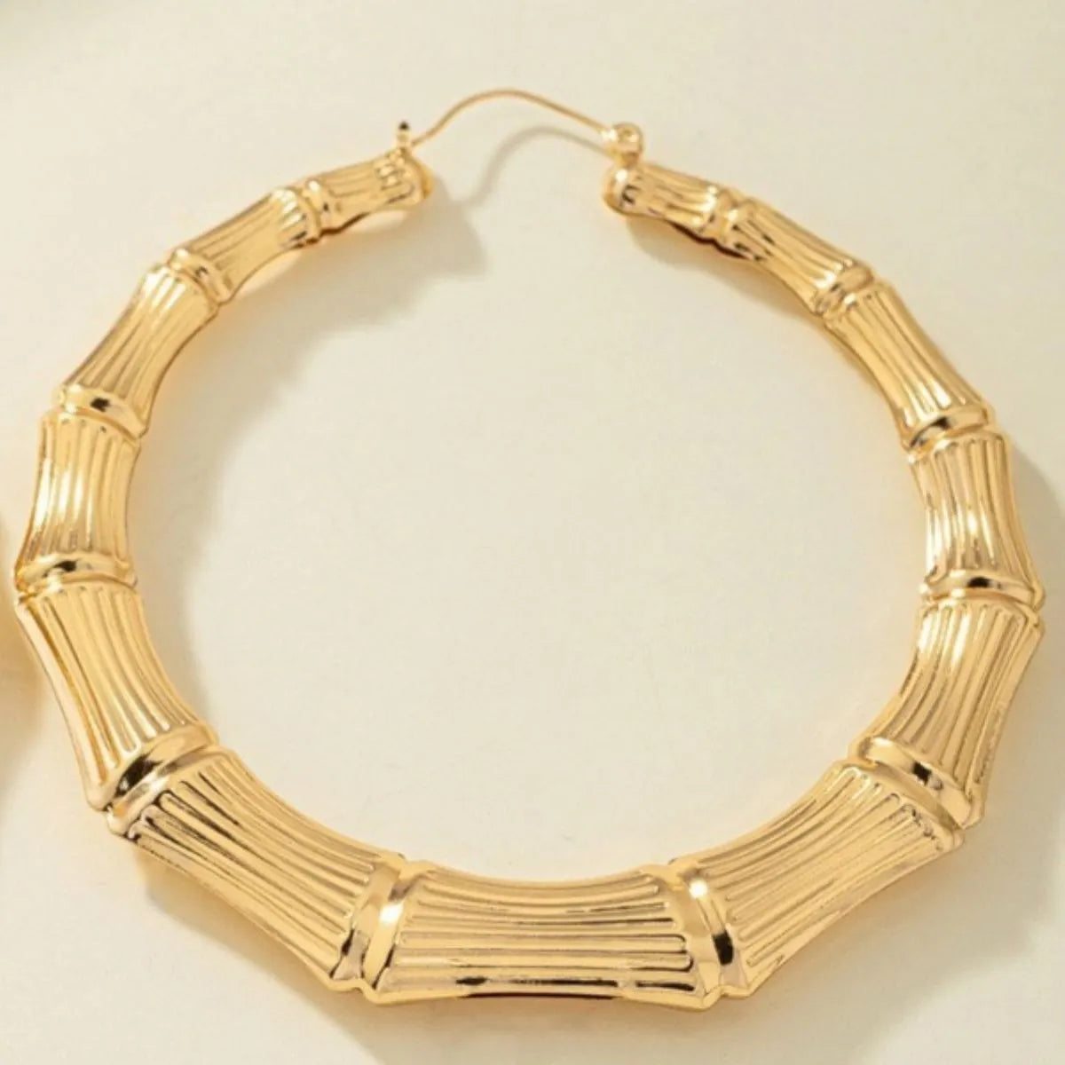 Side view gold plated textured hoop earrings women trend dangling length 2026