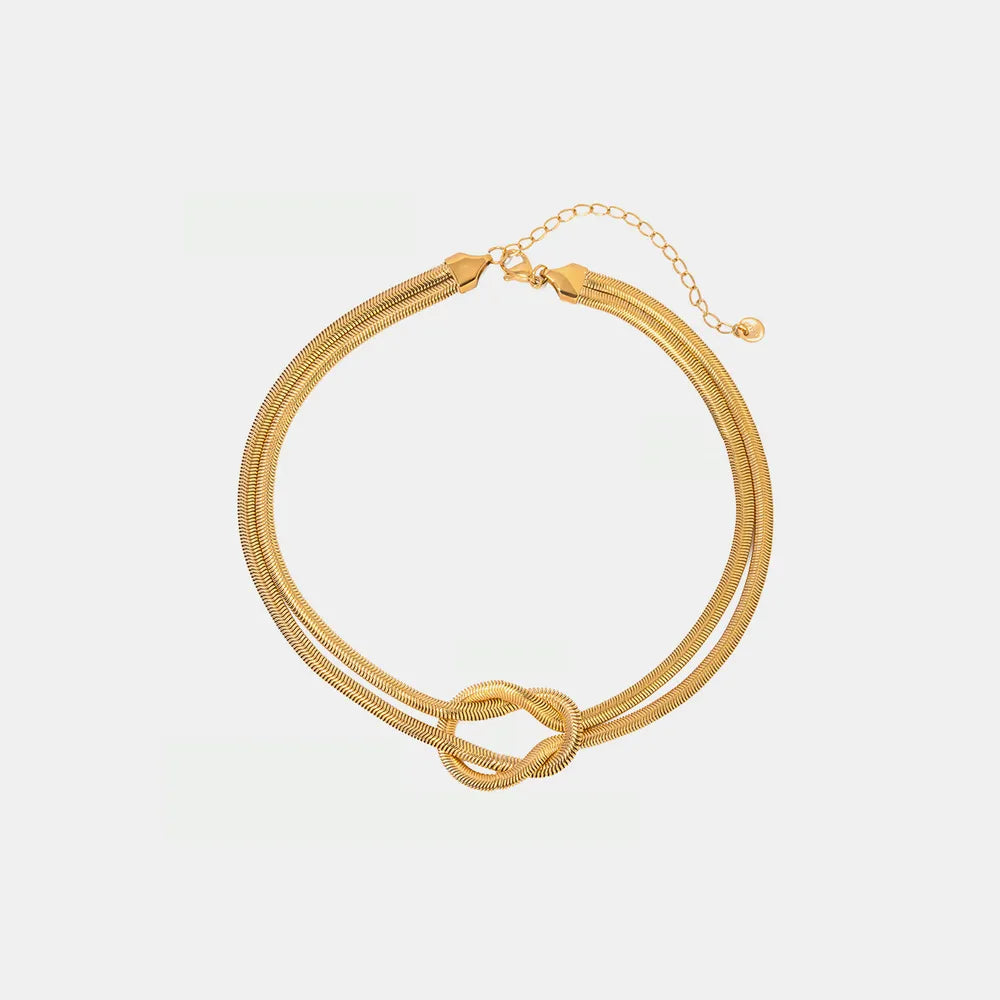 Twisted Layered Knot Gold Choker Necklace - Flat Display White Surface - Rebellious Gal  Jewellery