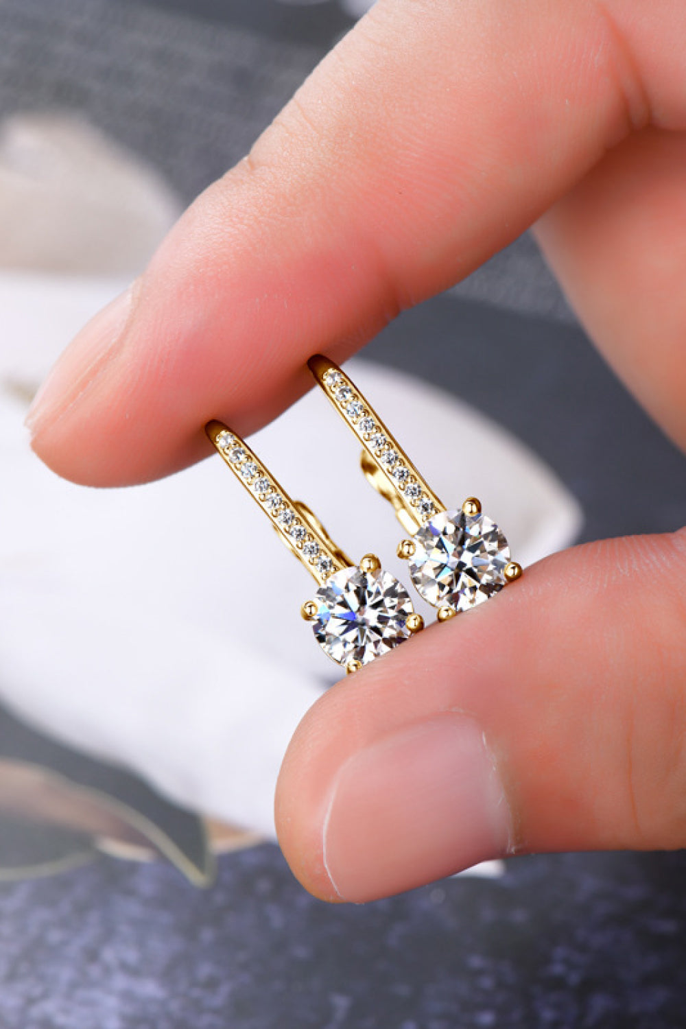 18K gold plated moissanite studs close up display