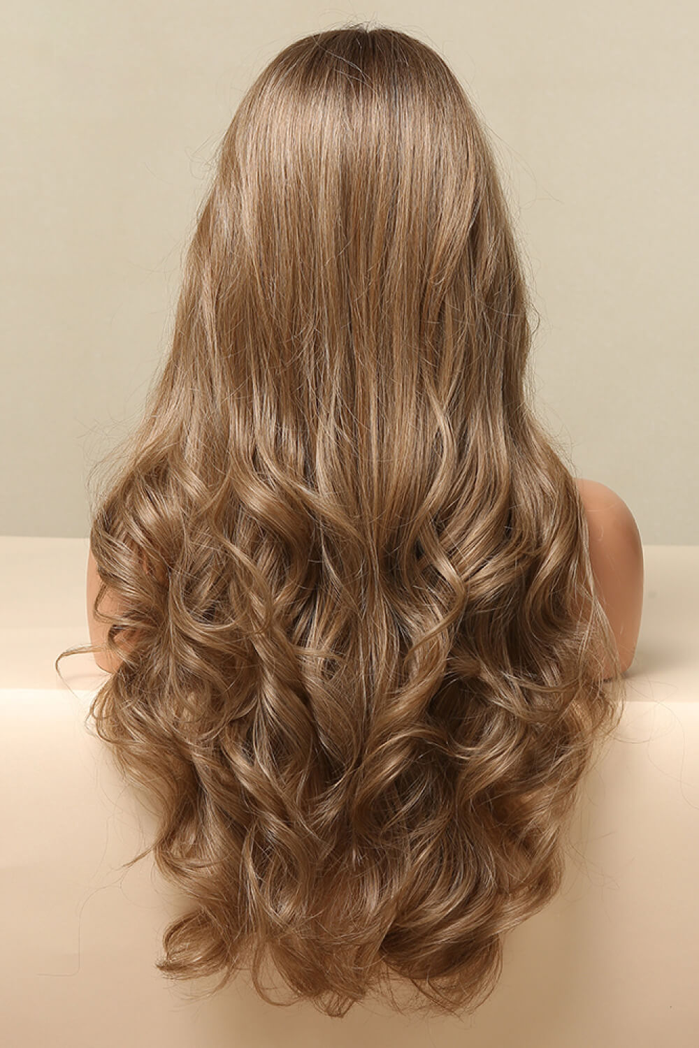 Close-up 150% density golden brown wavy waves 13x2 lace front wig Rebellious Gal detail shot