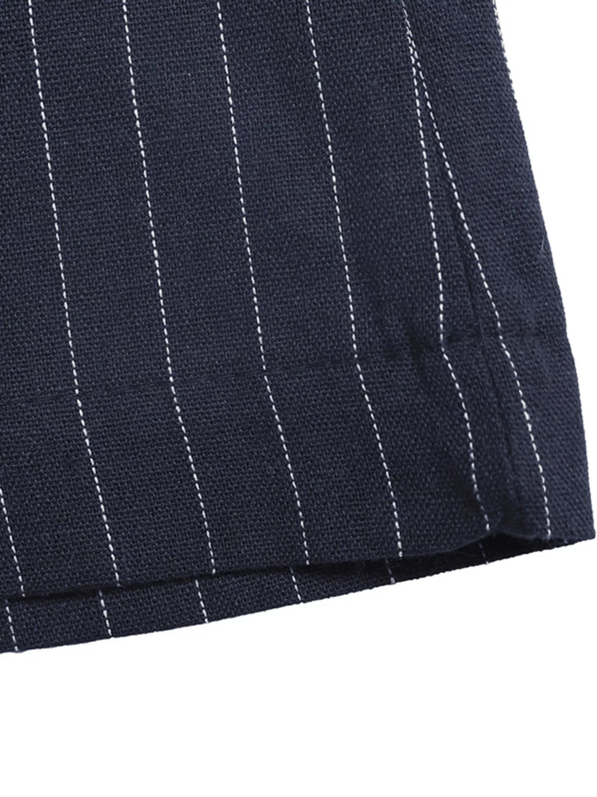 Navy pinstripe fabric with white lines on a white background