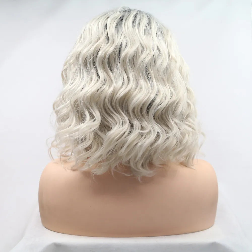 Front view of 12" mid-length wavy synthetic wig with 13x3 lace front on mannequin