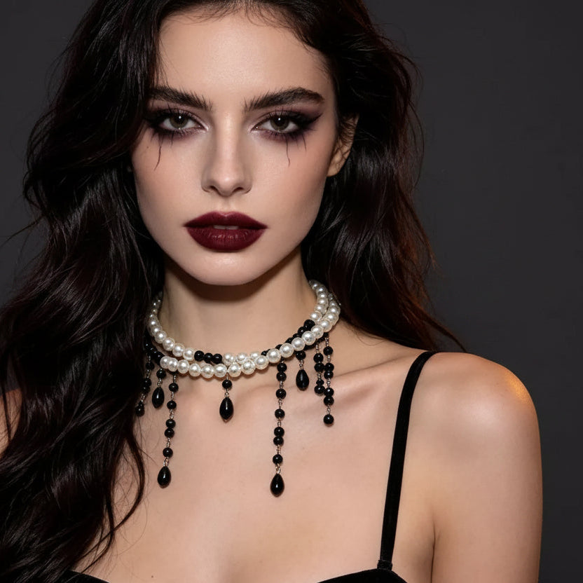 Pearl choker with black beaded drips worn with a black strappy top