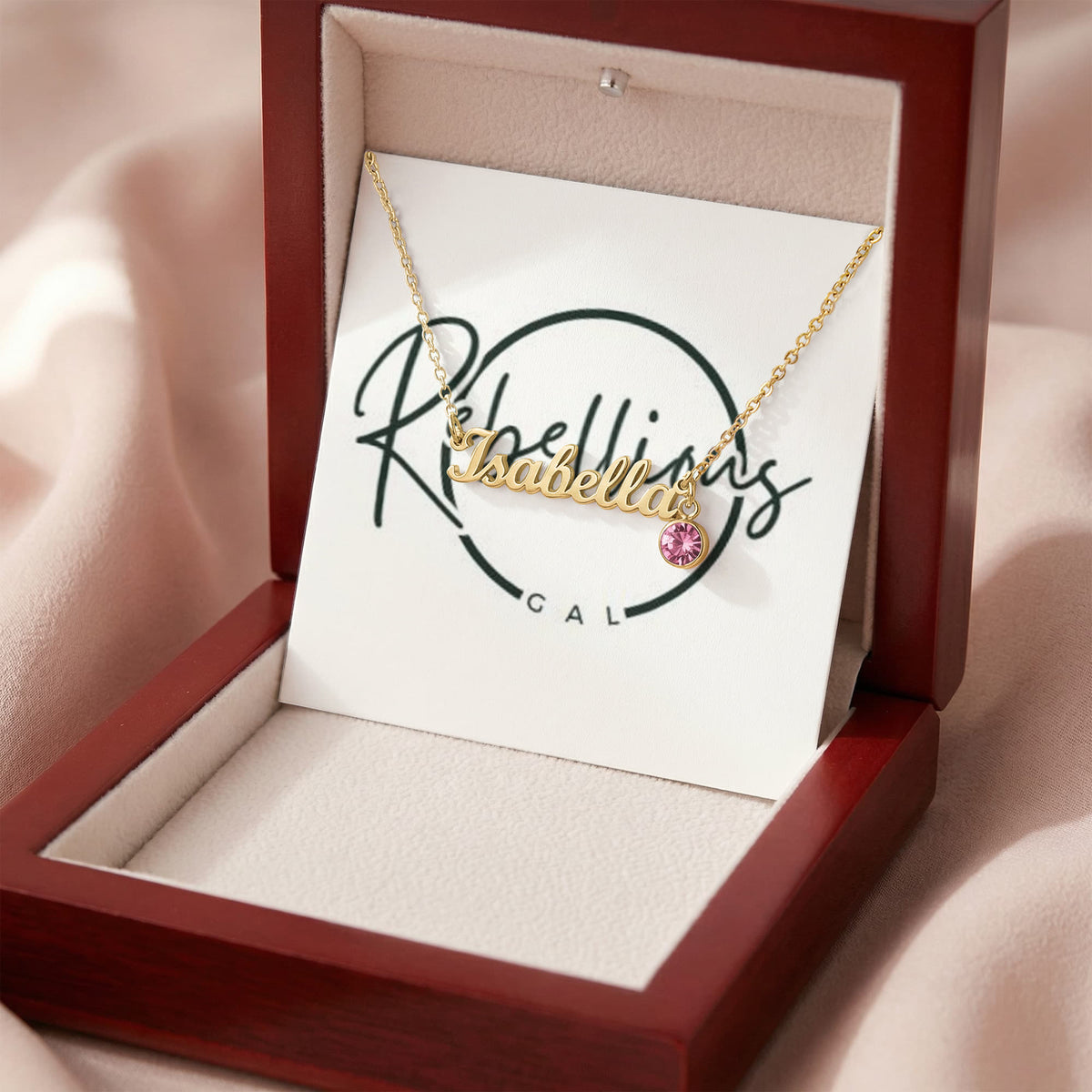 isabella necklace gold close up shot purple emerald