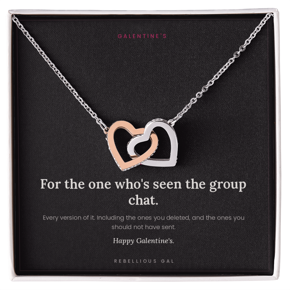 Rose gold and silver interlocking heart pendant in a white gift box with message card