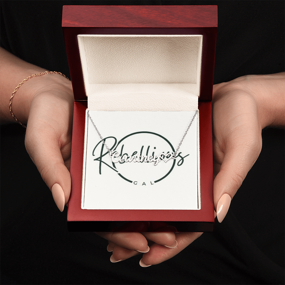 custom name silver necklace in a premium box in model hands