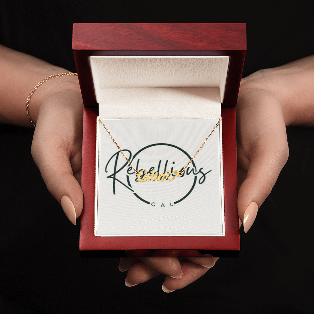 custom name necklace in a black box in models hands