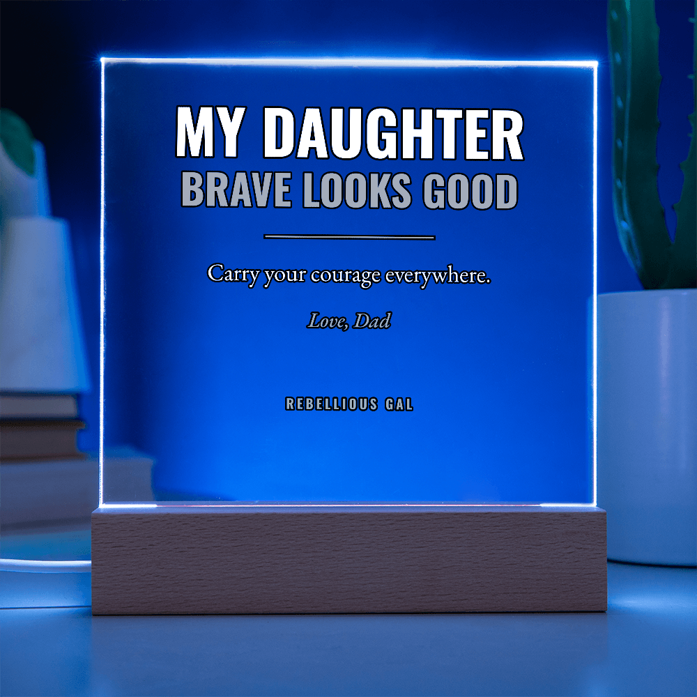 Lit deep blue with bright white edges, the panel glows above its shadowed wood base