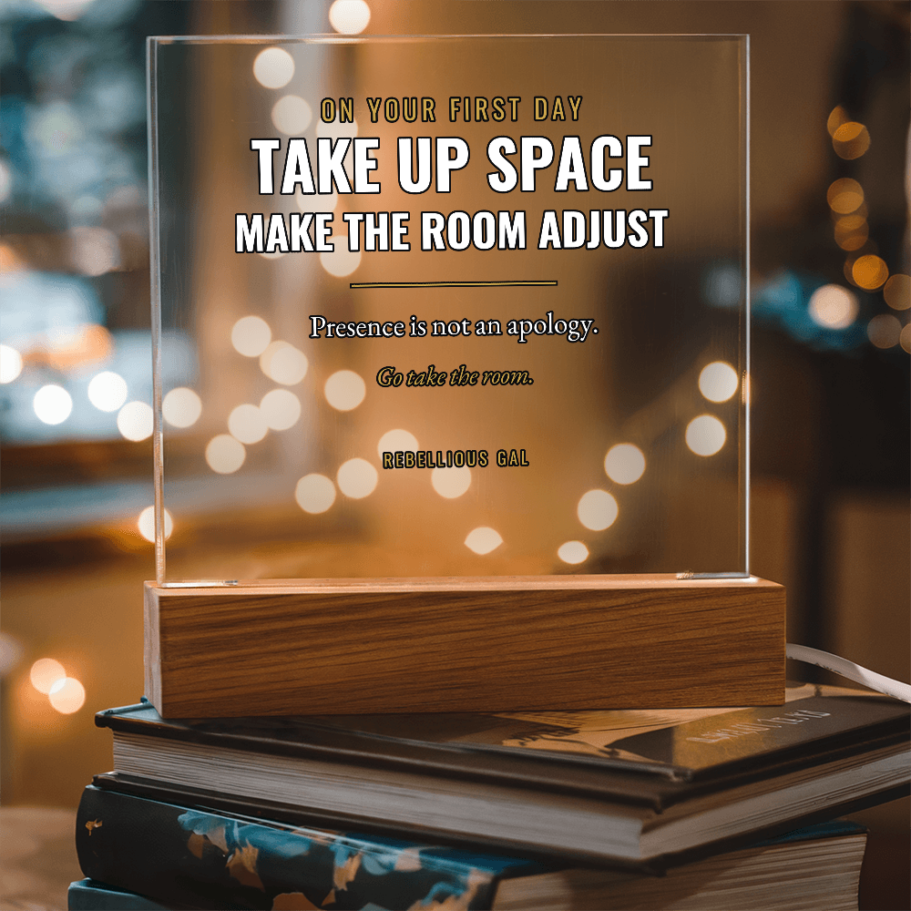 Take Up Space Make The Room Adjust in white caps, wood base resting on hardbacks