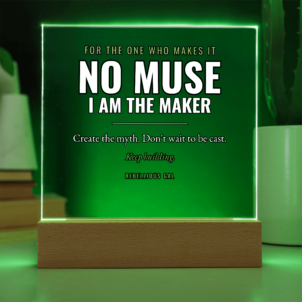 Light climbs from the wooden base, the square burning green between books and a potted plant