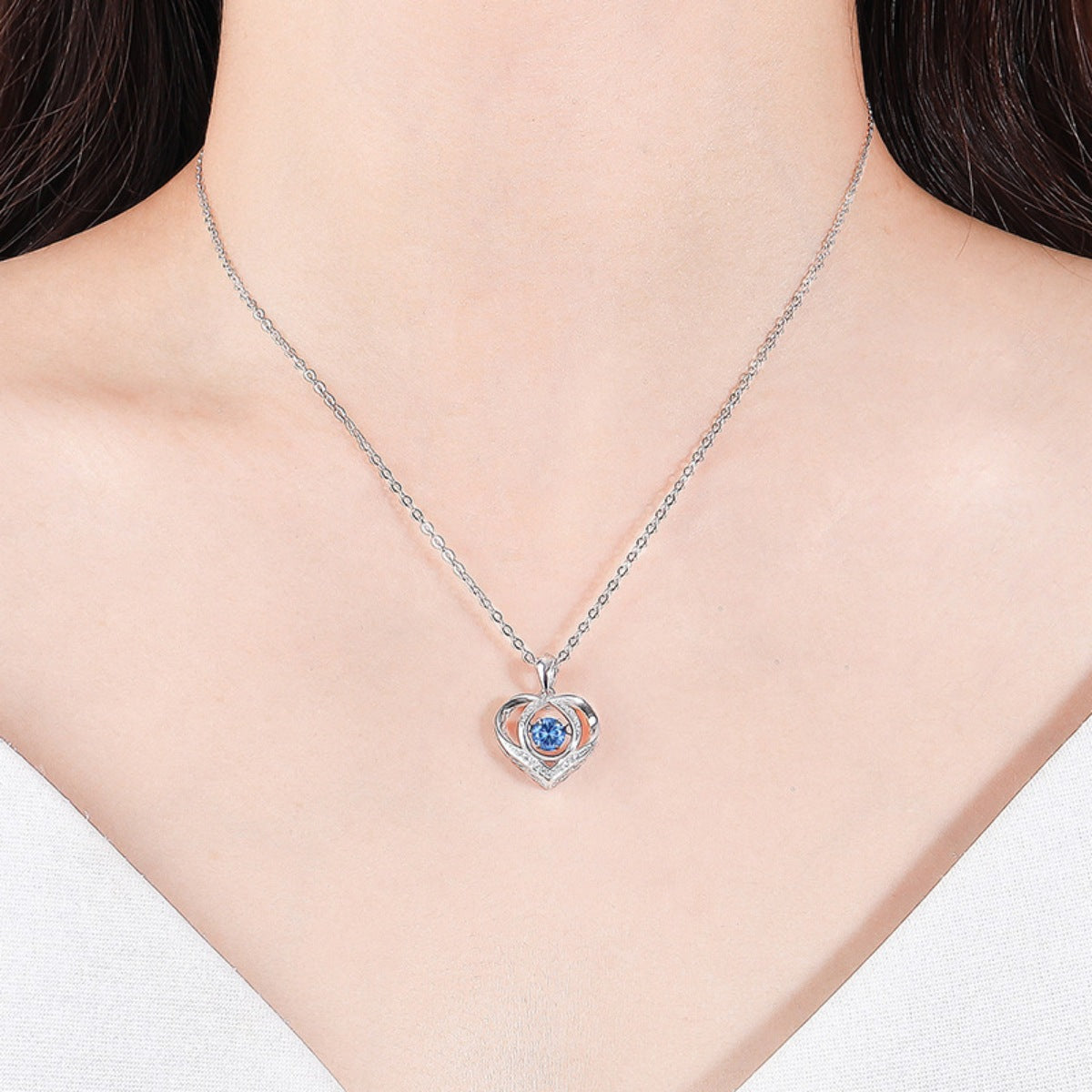 Model wearing Rebellious Gal rhinestone pendant necklace with rebellious layered look