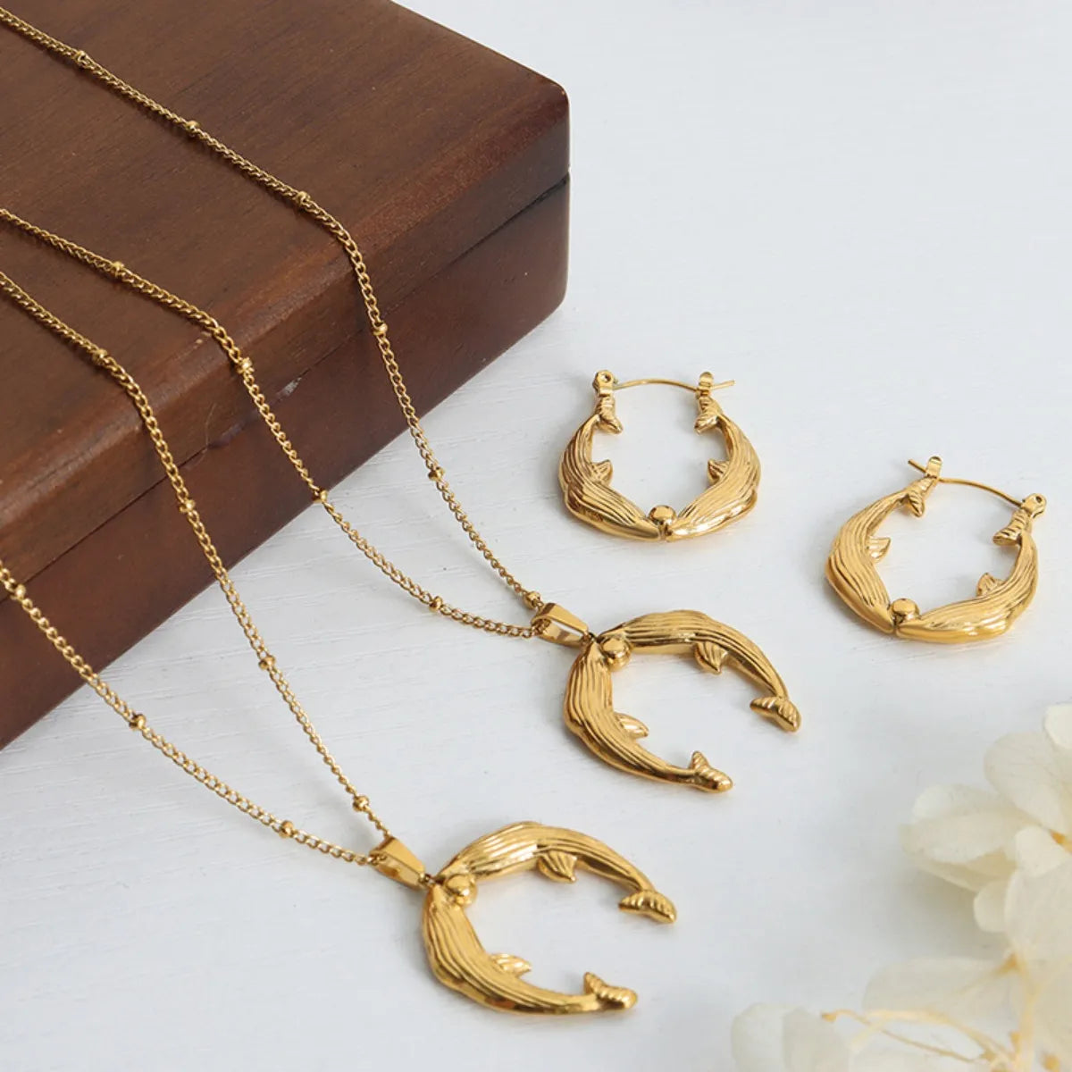 Kissing Dolphins Gold Plated Earrings and Necklaces | Rebellious Gal Jewelry