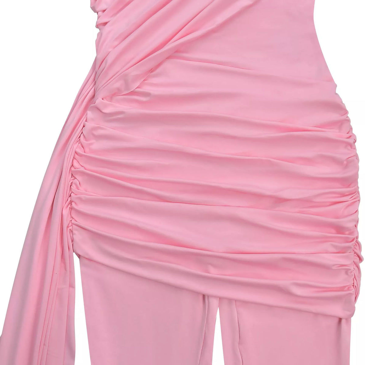Close-up of a pink ruched dress with a brand logo in the corner.