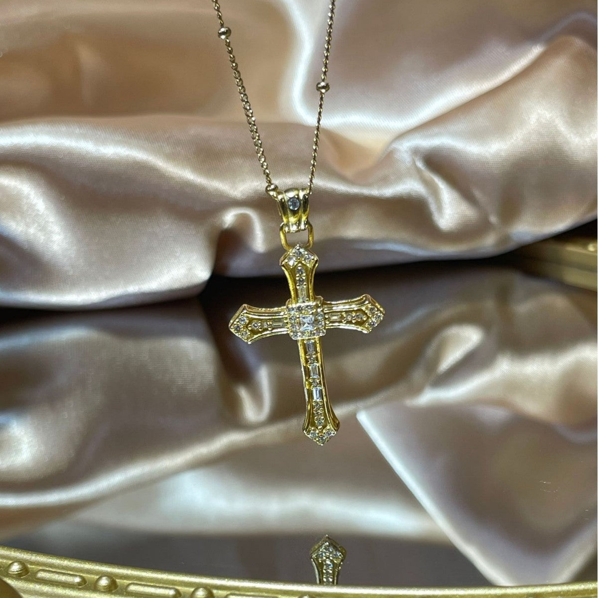 Defiant Faith cross pendant necklace full view on gold background
