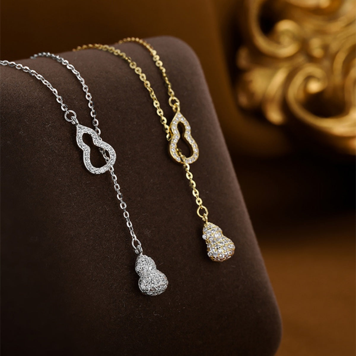 Close-up of sparkling zircon stone in 18K gold-plated sterling silver pendant